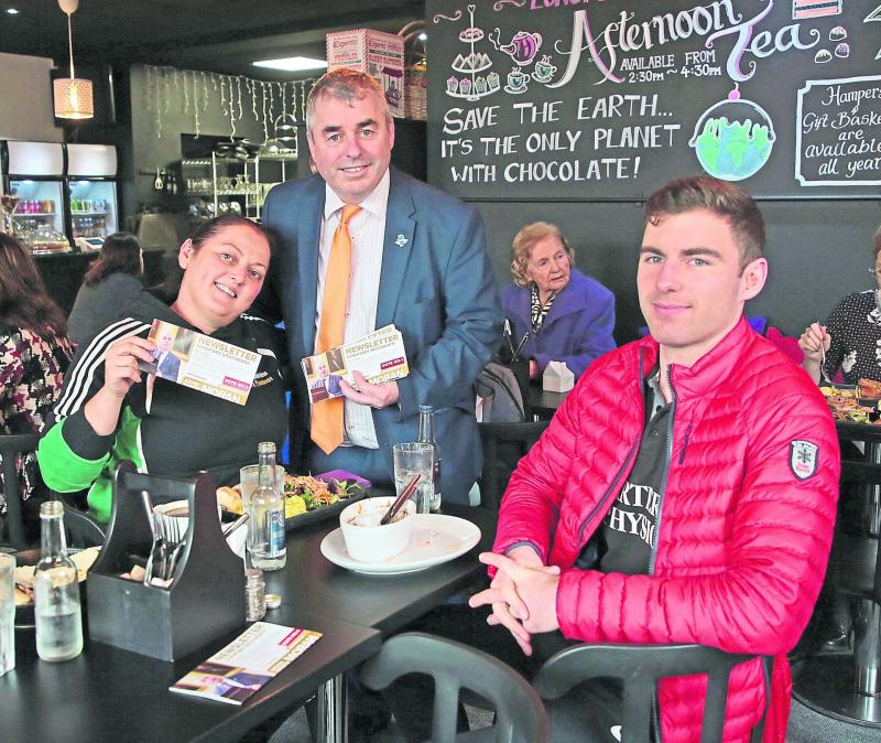 Independent general election candidate Kevin 'Boxer' Moran pictured on the canvass trail in Longford town last Friday where he met Miranda Moran and Joe McGowan Picture: Shelley Corcoran