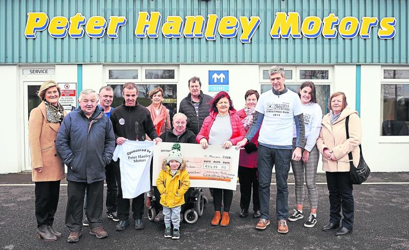 Brigid Mullooly is pictured presenting a cheque to PJ Cox (Chairperson of the Longford Branch of Multiple Sclerosis). Included in the photo are Anne O'Brien, Peter Hanley, Matthew Thompson, David Hanl