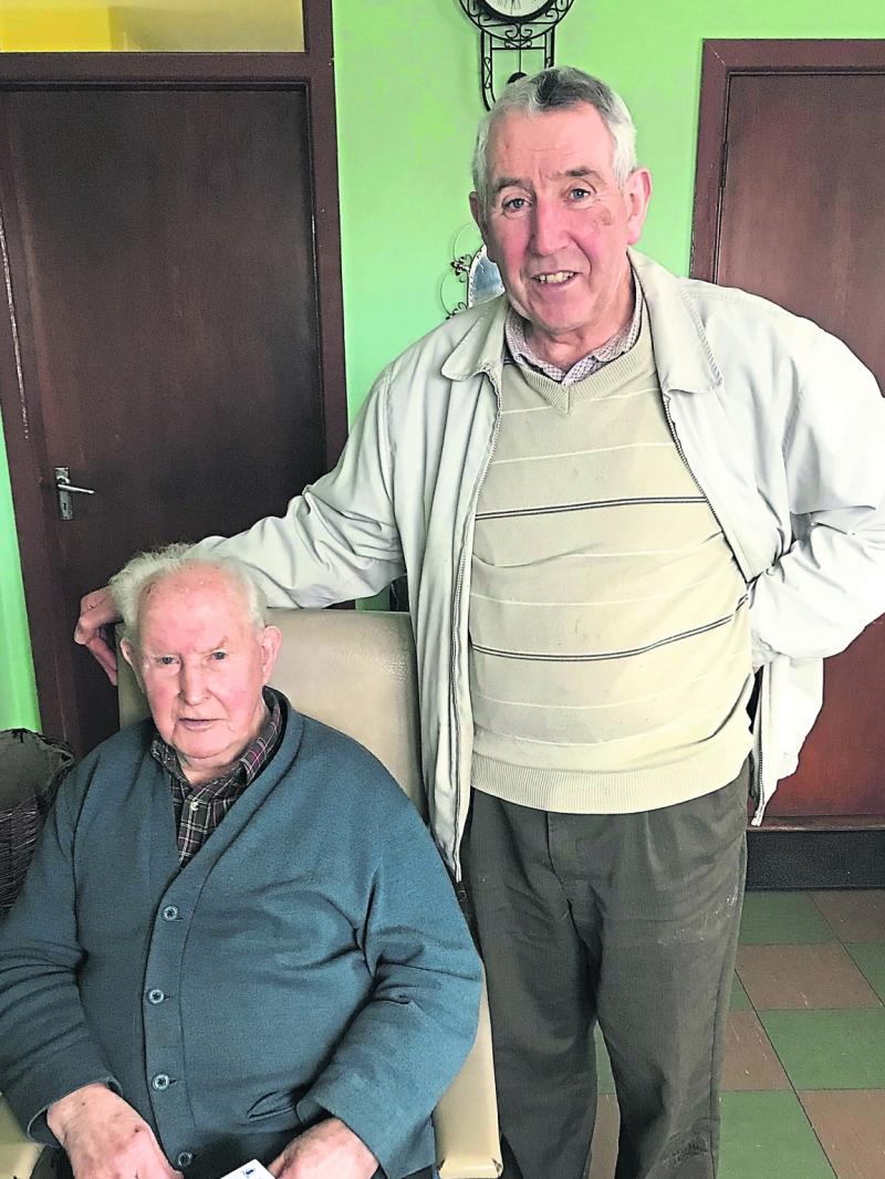 Willie Lyons (seated) who served on the committee which aimed to raise money to construct the mart and Michael McIntyre who at 48 years, is the longest serving mart employee