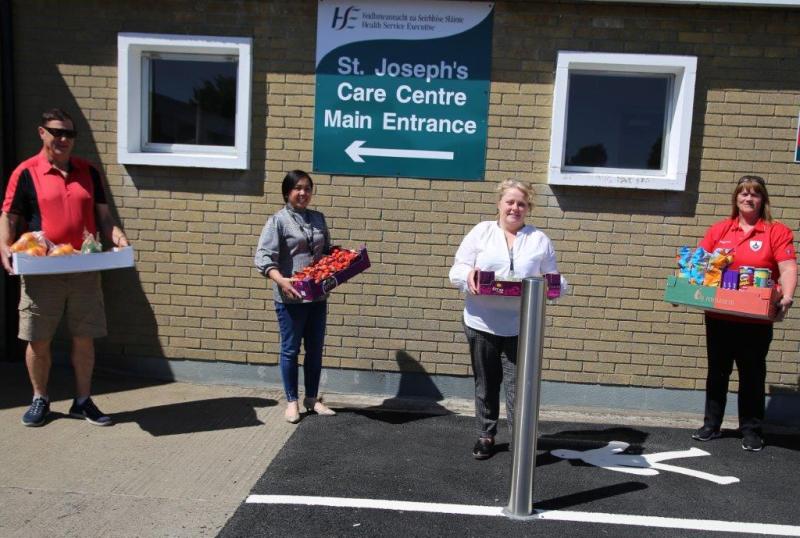 Longford Town FC Supporters Club present treats to frontline staff at St Joseph's Care Centre 