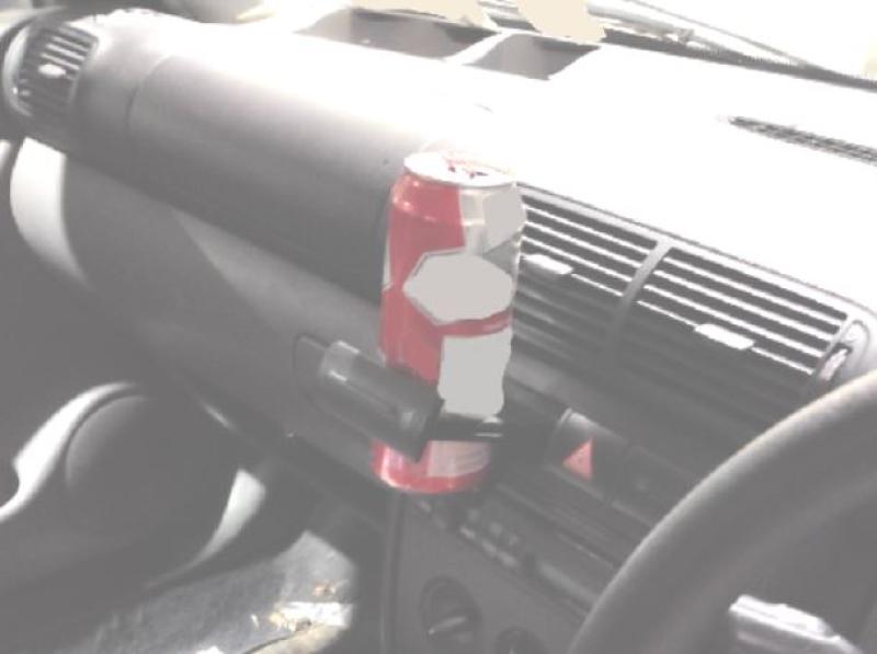 New use for coffee holder! Driver tried to hide on Garda&iacute;