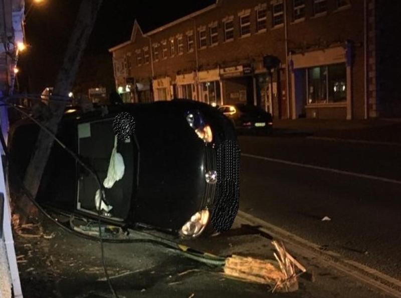Gardaí arrest driver of flipped car who was NINE times over legal alcohol limit