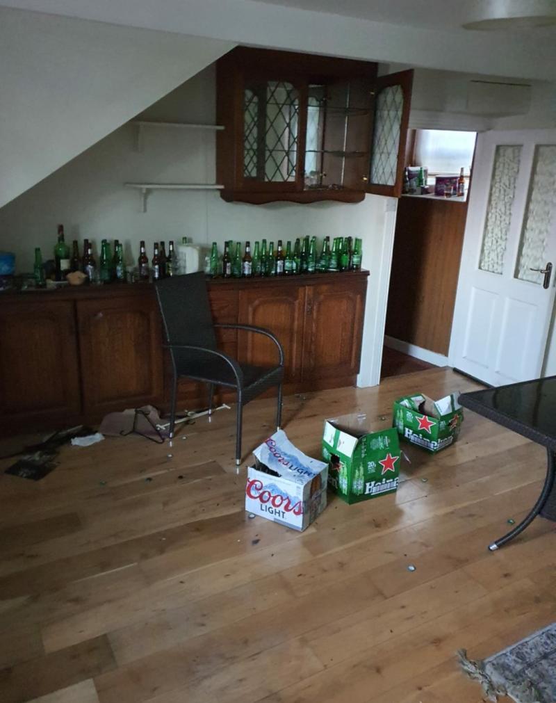 Gardaí raid second shebeen in as many days with lots of alcohol and people playing cards in front  of two open fires