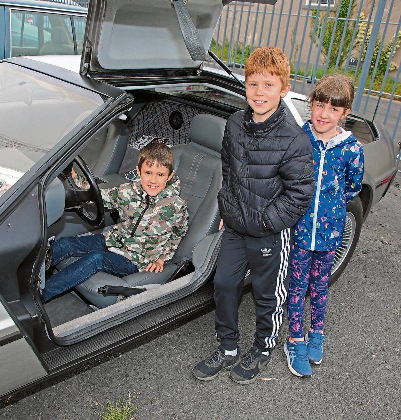 Oisin, Harry and Sabina Flanagan checking out the classic vintage cars at the 2022 Longford Vintage Club Show and Family Fun Day Picture: Shelley Circoran