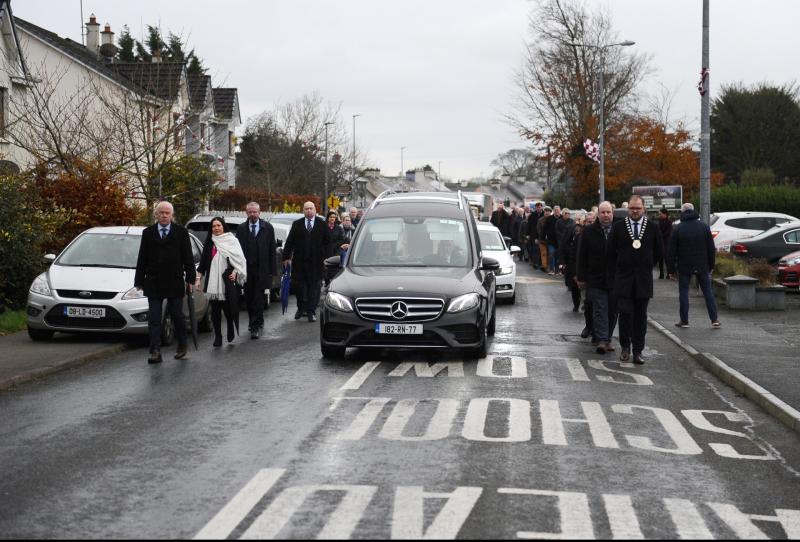 Longford mourners say farewell to political giant Louis J Belton