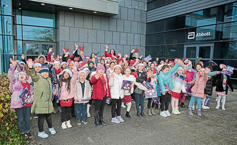 St Joseph’s pupils visit Abbott Longford to turn on Christmas lights and sing carols