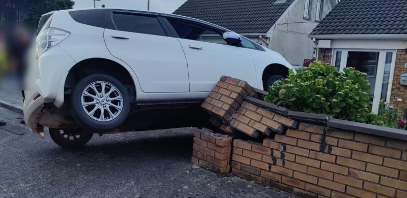 'Can't park there mate' - emergency services called to crash where car mounted wall