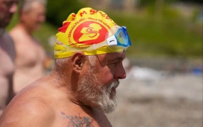62 year-old man raises thousands in record-breaking River Shannon swim
