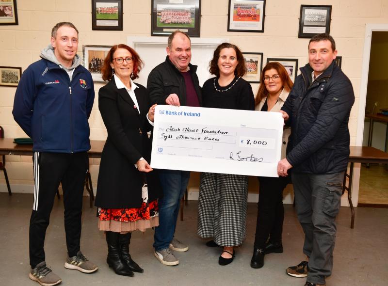 Longford 'Quid Games' champion Robert Forbes presents €8,000 winnings to designated charity 