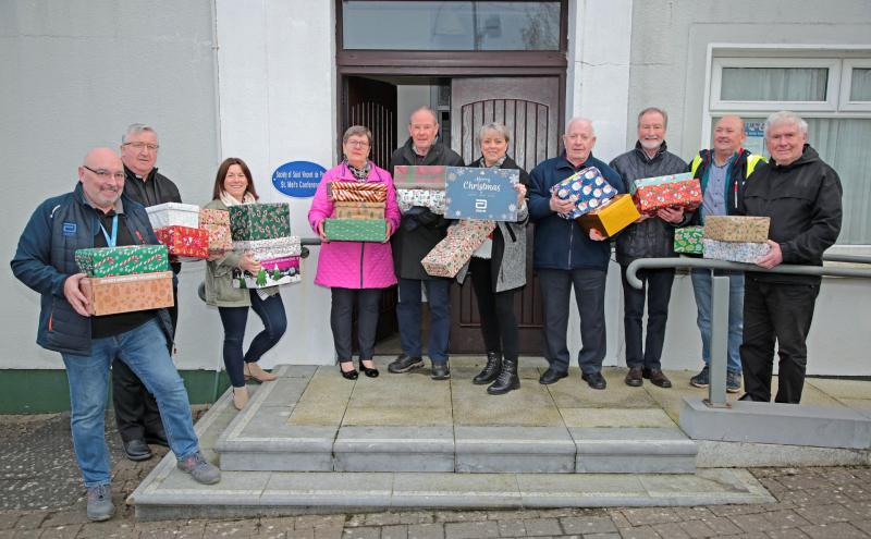 The spirit of Christmas: Abbott Longford present shoeboxes to St Vincent de Paul