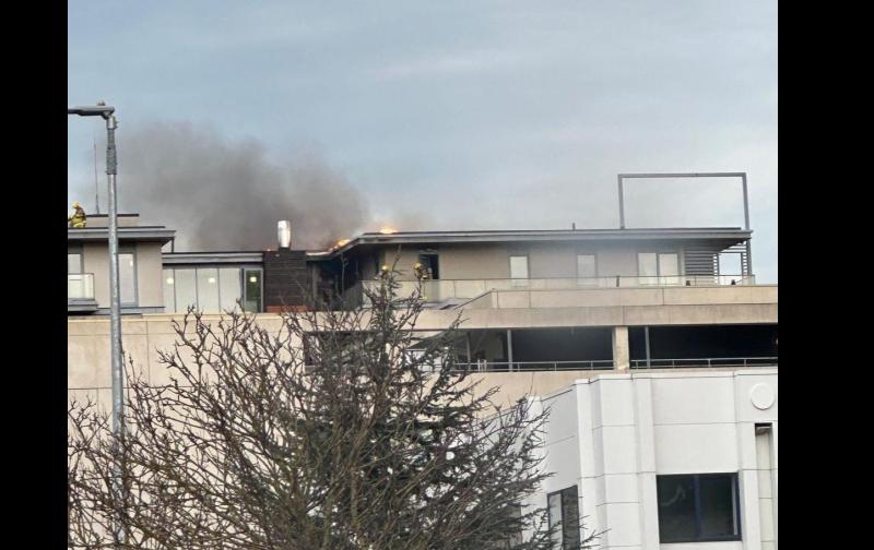 Firefighters rush to scene of fire on top floor of Irish apartment building