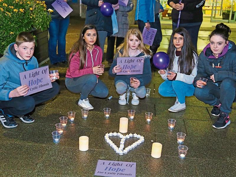 Crowds gather for Light of Hope CF vigil in Longford town