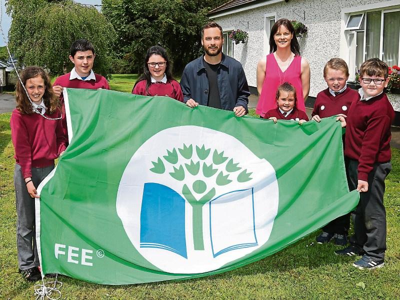 DJ raises Cloontuskert NS Green Flag