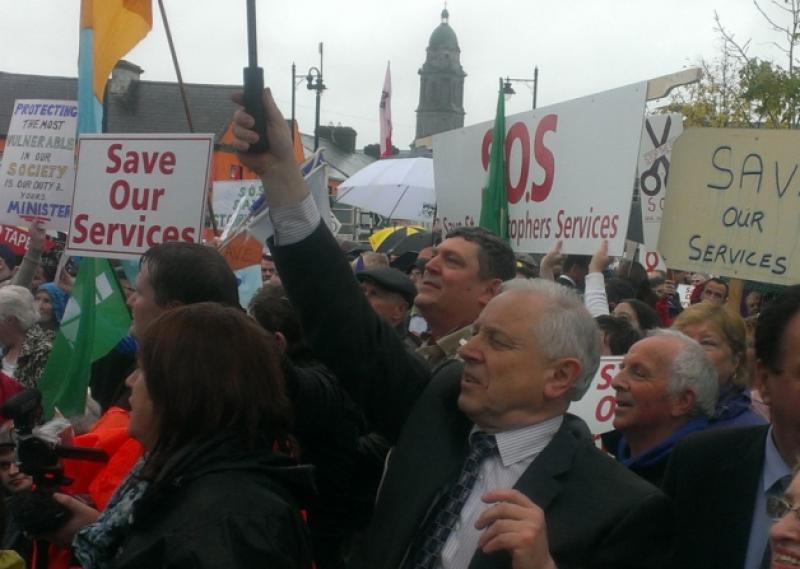 St Christopher's Services CEO Pat O'Toole and Longford County Council Cathaoirleach Cllr Mark Casey chant 'Save Our Services' during the protest rally in Longford town today.