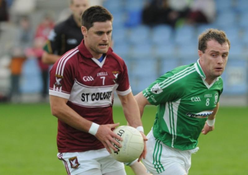 Shane Mulligan surging forward for Mullinalaghta St. Columba's in this tussle with Clonguish opponent David Barden. Action from the Senior Football Championship semi-final at Glennon Brothers Pearse Park on Sunday evening last. Photo: Declan Gilmore Photography