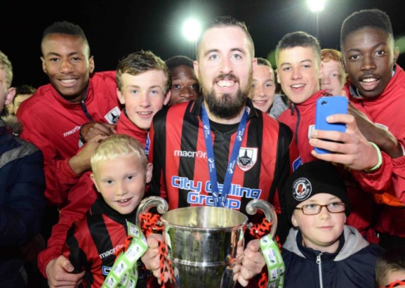 Longford Town club captain Mark Salmon proudly holds the SSE Airtricity League First Division Trophy following the 5-0 win over Shamrock Rovers B at City Calling Stadium back at the beginning of October.