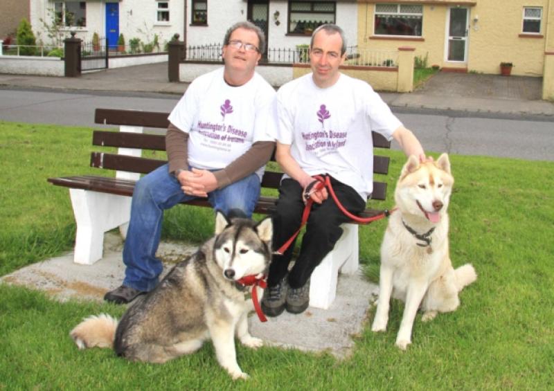 Mark McDonald and Joe Doran with Cody and Nanook. Photo: Michelle Ghee. www.gphotos.ie