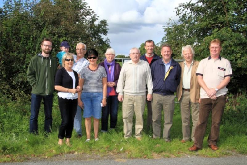 Helen O'Halloran, Robert Geoghegan, Jack O'Rourke, Tom O'Rourke, Mary O'Rourke, Mary Melvin Geoghegan, Seamus McRory, Bernard Duffy, Barry Kenneally, Rev. David Catterall and Chairman of the Abbeycartron/Aughadegnan Residents Committee Fergus Reynolds. Photo: Michelle Ghee. www.gphotos.ie