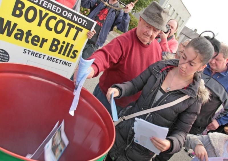 Laurence Masterson and Lisa Vernon at the 'Burn Your Bill' event in Longford town on Saturday afternoon last. Photo: Shelley Corcoran
