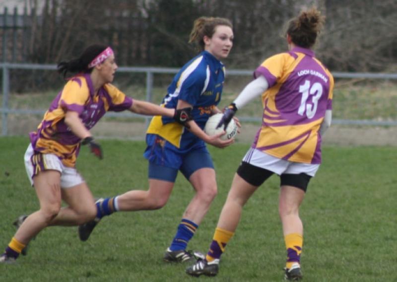Longford's Aisling Reynolds pictured taking on Wexford opponents Roisin Murphy and Fiona Rochford. Photo: Charlie Canning