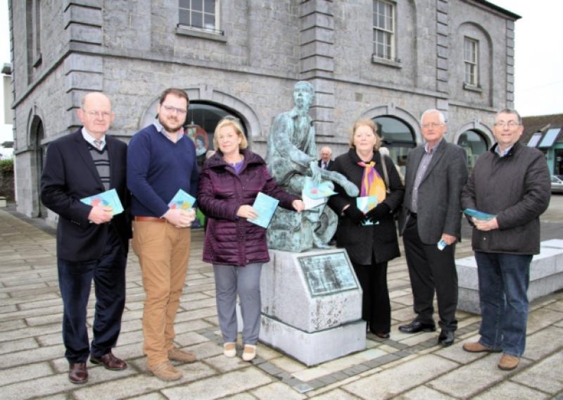 The theme of the 31st Oliver Goldsmith Literary Festival is 'Our greatest glory consists not in never falling, but in rising every time we fall' and pictured at the launch of the festival at the statue of Oliver Goldsmith outside Ballymahon Library are l to r; Chairperson Seamus McCormack, Cllr Colm Murray, Sarah Frawley, Breege Murray, Dermot Sheehy and Cllr Mick Cahill. Photo: Michelle Ghee. www.gphotos.ie