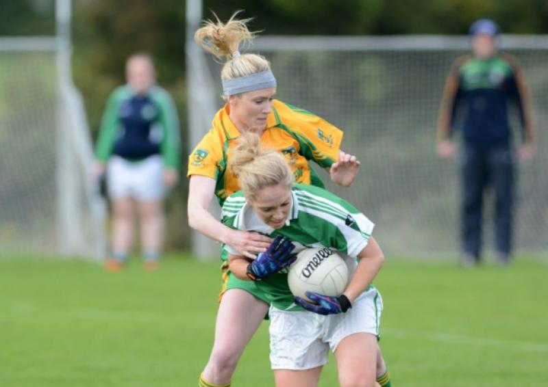 Clonguish defender Mairead Moore holds off the challenge of Stabannon forward Jenny McGuinness. Action from the Leinster Ladies Intermediate Club Football Championship quarter-final in Stabannon on Saturday last.  Photo: Ciaran Culligan.