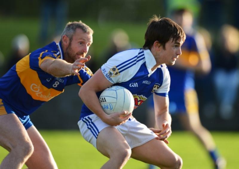 St. Mary's Granard player Paddfy McGivney is first to the ball as Noel Reynolds of Dromard closes in during the second round of the Senior Football Championship on Saturday last at Allen Park. PHOTO: RAY DONLON