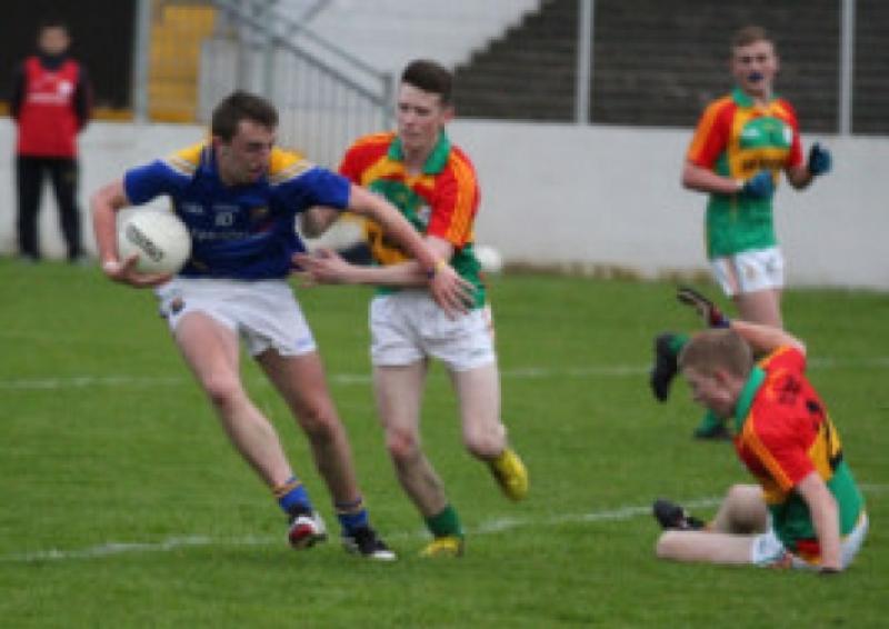 Nigel Rabbitte on the ball for Longford in his attempt to evade the challange of a Carlow opponent. Action from the Leinster Minor Football Championship Round 2 Qualifier at Dr. Cullen Park on Wednesday evening  of last week. Photo: Mel Brady