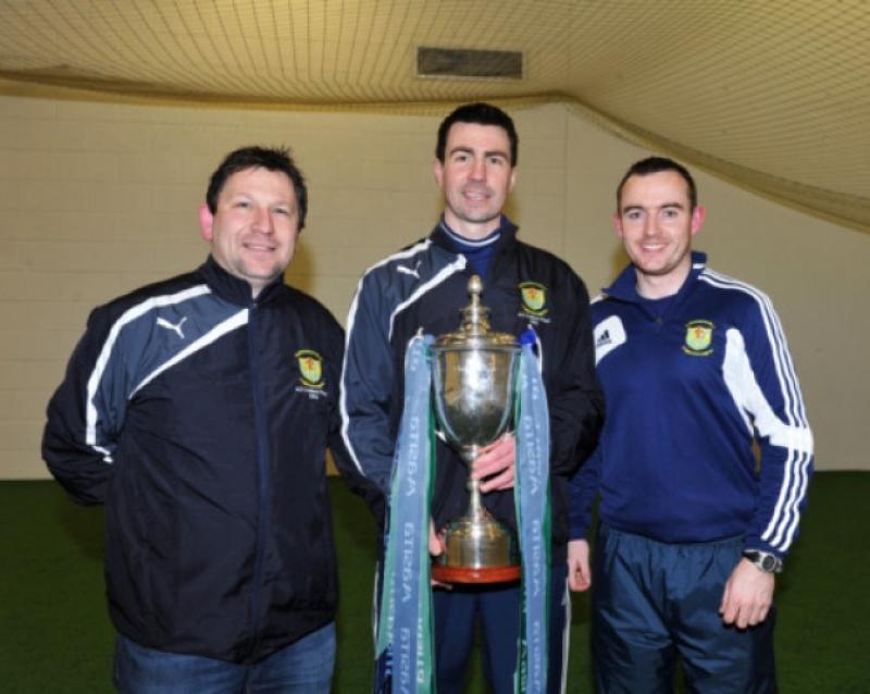 Cnoc Mhuire Granard team management Owen Swaine, James Carroll (manager) and Ryan Plunkett pictured with the cup after the All Ireland Vocational Schools Senior 'A' Football Championship Final on Saturday last at Croke Park. Photo: Ray Donlon