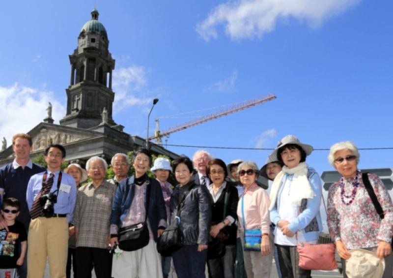 Padraig, Senan and Cathal McWeeney with the Japanese visitors who came to Longford on Saturday.