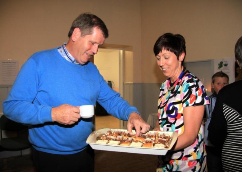 Elaine McDermott serves John Belton at her recent fundraising night at the community hall in Moydow. Photo: Michelle Ghee. www.gphotos.ie