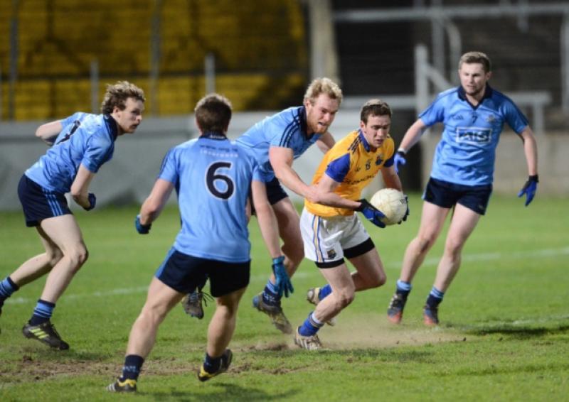 Longford's Liam Connerton on the ball but being closed down by Dublin's defence. Photo: Declan Gilmore