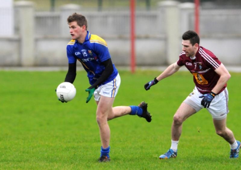 Paul McKeon on the ball for Longford in evading the challenge of Westmeath opponent James Dolan. Action from the O'Byrne Cup Round 3  game at Leo Casey Park in Ballymahon on Sunday last.