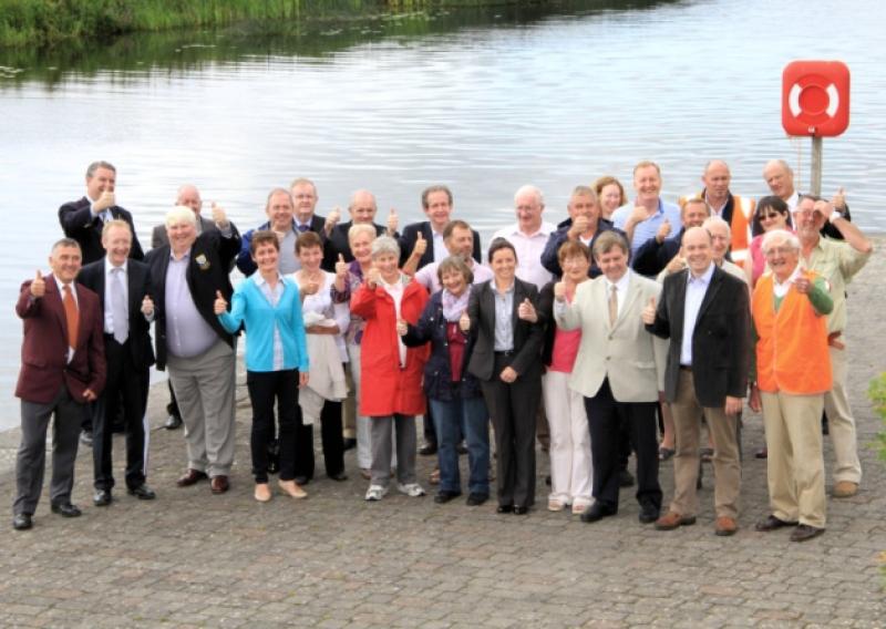 Locals and committee members give the thumps-up to plans for a six figure riverbank amenity park in Ballyleague. Photo: Michelle Ghee. www.gphotos.ie