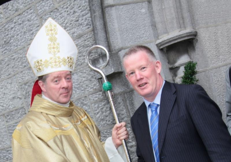 Principal of St Mel's College, Declan Rowley, congratulates Bishop Francis Duffy at St Mary's Pro-Cathedral in Athlone. Photo: Shelley Corcoran