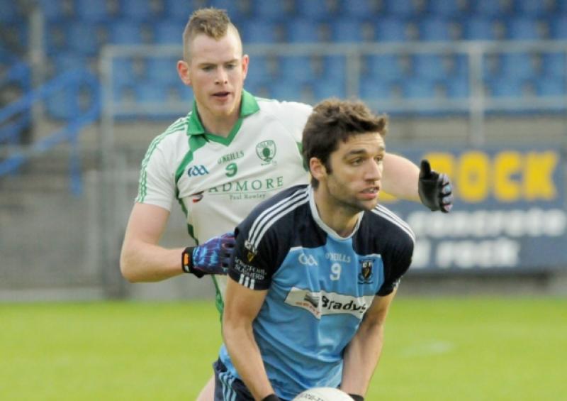 David Sheridan on the ball for Longford Slashers in this tussle with Killoe  opponent Simon Kiernan. Action from the Senior Football Championship semi-final at Glennon Brothers Pearse Park on Sunday evening last. Emmet Og won by 0-11 to 1-4. Photo: Declan Gilmore Photography