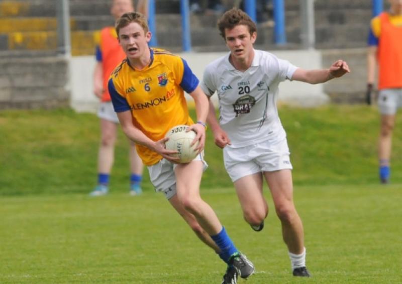 Longford defender Dessie Reynolds accelerates away from Kildare's Con Kavanagh. Photo: Declan Gilmore
