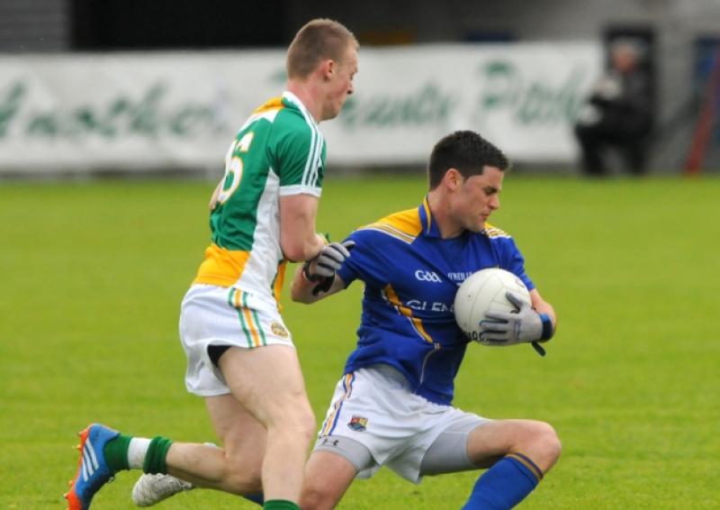 Shane Mulligan, seen here competing against Offaly's Peter Cunningham, scored a cracking point for Longford. Photo: Kevin Leavy