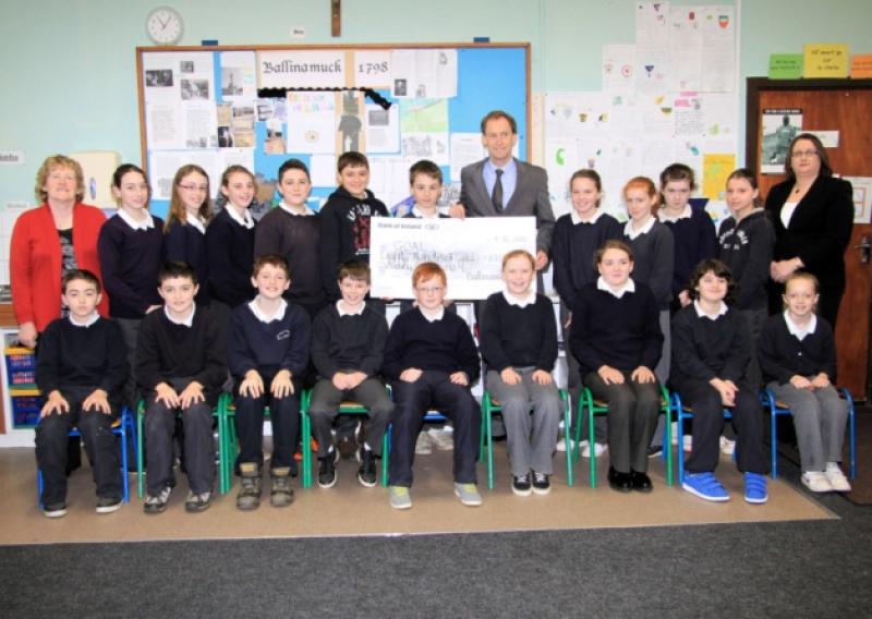 The fifth and sixth class pupils of Ballinamuck NS with Principal Dolores Tohey, GOAL CEO Barry Andrews and Director of the National Parents Council (Primary), Mary Lillis. Photo: Michelle Ghee. www.gphotos.ie