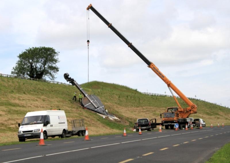 The giant violin sculpture being installed on Longford's N5 by-pass on Saturday morning, May 31.Photo: Michelle Ghee. www.gphotos.ie