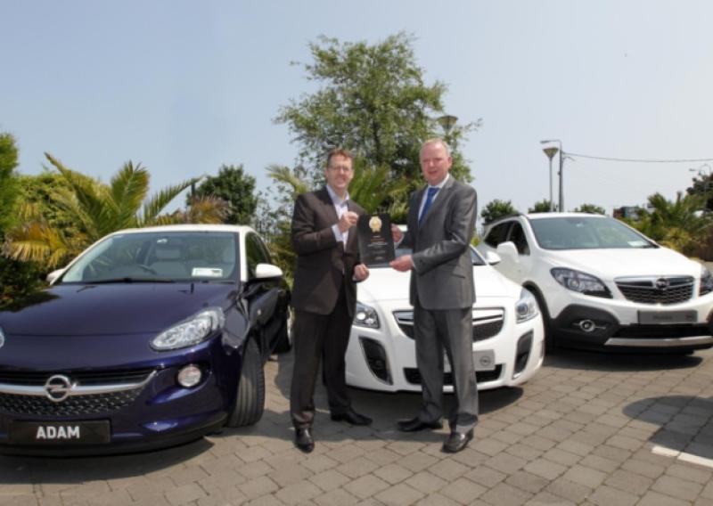 Central Motors Mohill, Co Leitrim were one of 12 dealerships around the country to receive the Opel Customer Excellence Award 2012. Pictured are Dealer Principle Paul Walpole and Opel Ireland Managing Director Dave Sheeran.