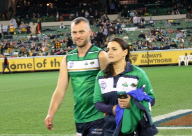 Legan native Peter Ross represented Ireland at the AFL International Cup in Australia in August and he is pictured at the Melbourne Cricket Ground with the Irish team team chiropractor, his wife Tammy Ross.