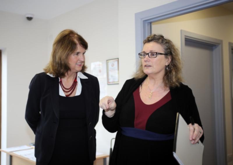Longford Women's Link CEO Louise Lovett (right) pictured with Tanaiste Joan Burton during her visit to the organisation's facilities in Longford town last year. Photo: Michelle Ghee. www.gphotos.ie