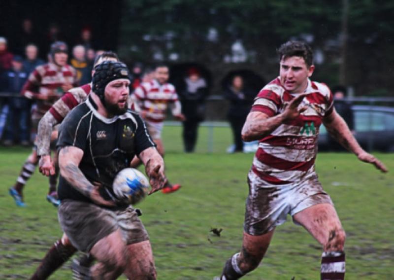 Dylan Quinn making a powerful run for Longford against Tullow in the Provincial Towns Cup second round clash at CPL Park on Sunday last.  Photo: Gary Nolan