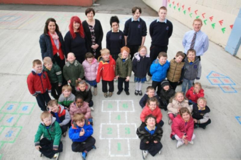 Mrs Dirdge Healy, Shannan Walsh, Mrs Josephine Donohoe, Hayleigh Doherty, Daniel Hawkin, Jake O'Shea and Mr Herbert Farrell with the Junior InfantsPhoto by Shelley Corcoran