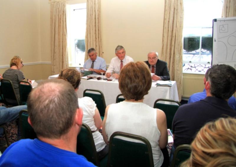Brian Leahy and Brendan Muldowney from Muldowney & Co with Fintan McGill from Sherry FitzGerald McGill at last week's auction. Photo: Michelle Ghee. www.gphotos.ie