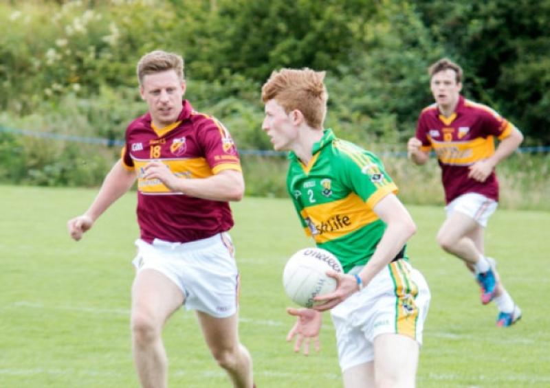 Ardagh defender Gareth Dennigan clearing the danger ahead of Fr. Manning Gaels opponent David Cassidy. Action from the Senior Football Championship Round 2 game at Devine Park. Photo: Michael Croghan/Declan Gilmore Photography