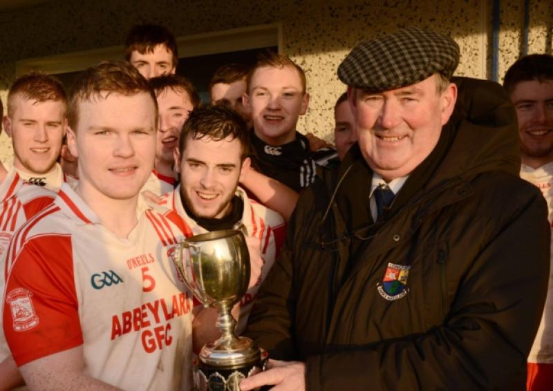 County Board Chairman Brendan Gilmore presenting the Under 21 'B' Football Championship Cup to Abbeylara captain Michael McHugh following their 2-8 to 2-7 win over Longford Slashers in the final at Glennon Brothers Pearse Park on Sunday last. Photo: Declan Gilmore Photography