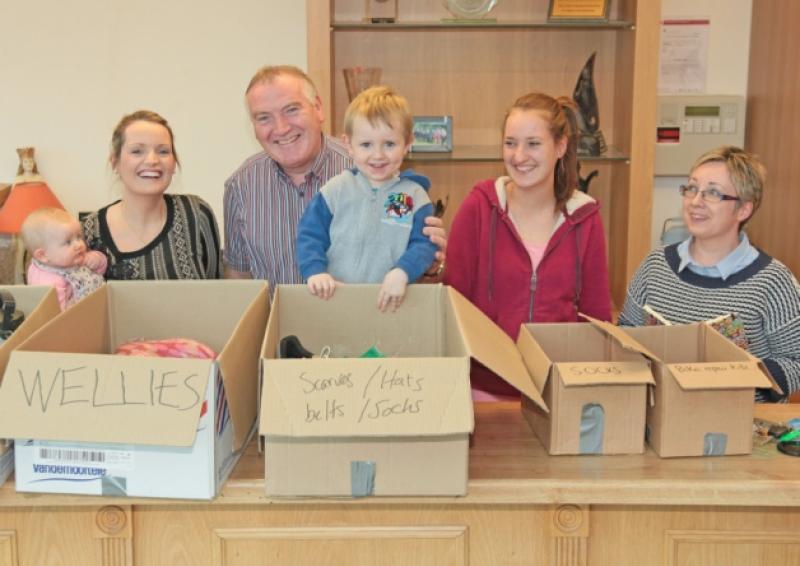Kate and Claire Campbell, Frank Kiernan Snr, Dan Campbell, Emma Kiernan, and Michelle Killian preparing for the collections. Photo: Shelley Corcoran