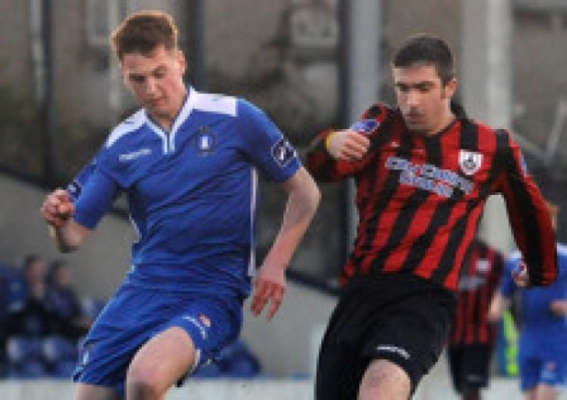 Limerick defender Paudie O'Connor challenges Longford Town's Kevin O'Connor for the ball in last Saturday's Premier Division game at Jackman Park. Picture: Gareth Williams